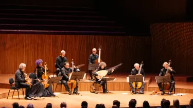 An Orchestra playing in the Concert hall.